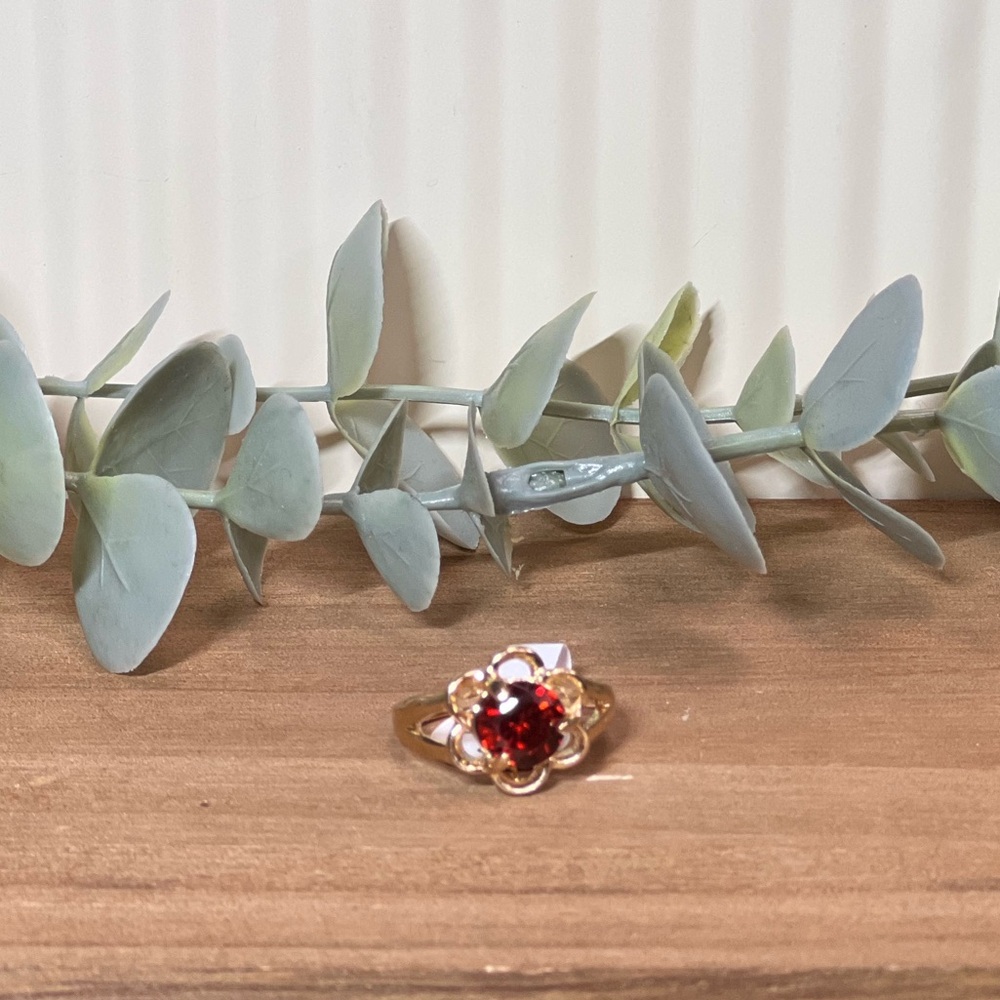Gold Cubic Zirconia Ring with Red Gemstone Floral Accent